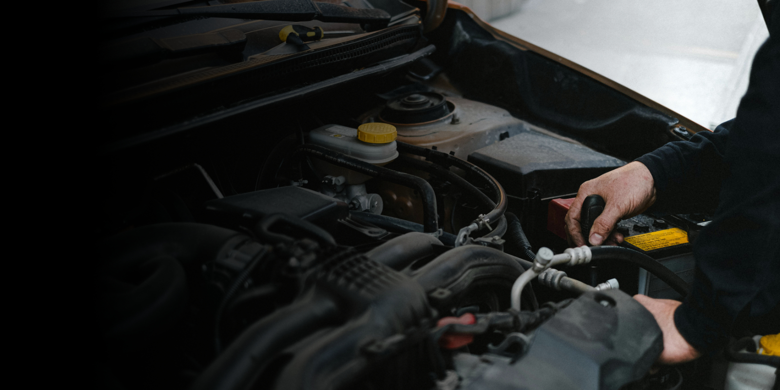 Mechanic working on car 